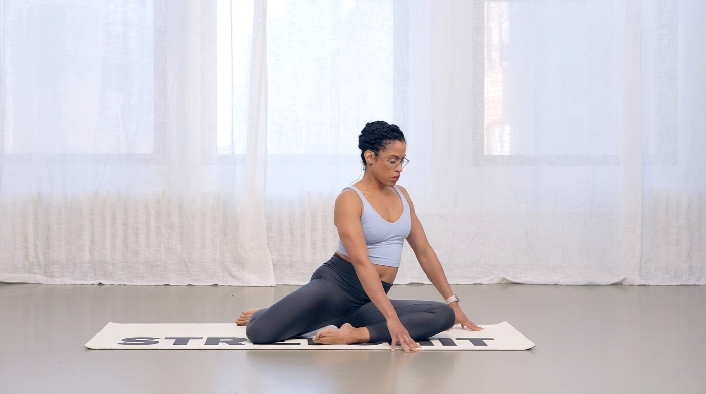 woman performing hip drop exercise with internal rotation stretch