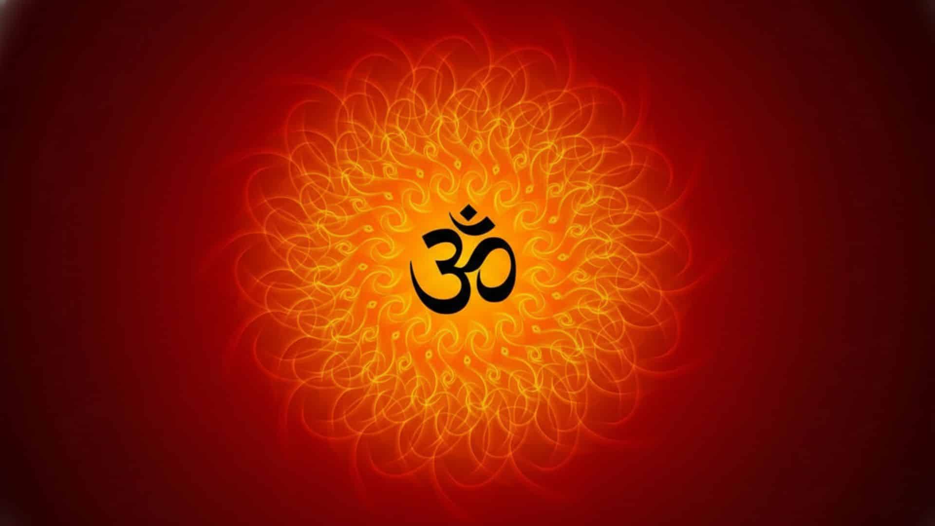 om-symbol-centered-in-a-glowing-orange-mandala-on-a-red-background